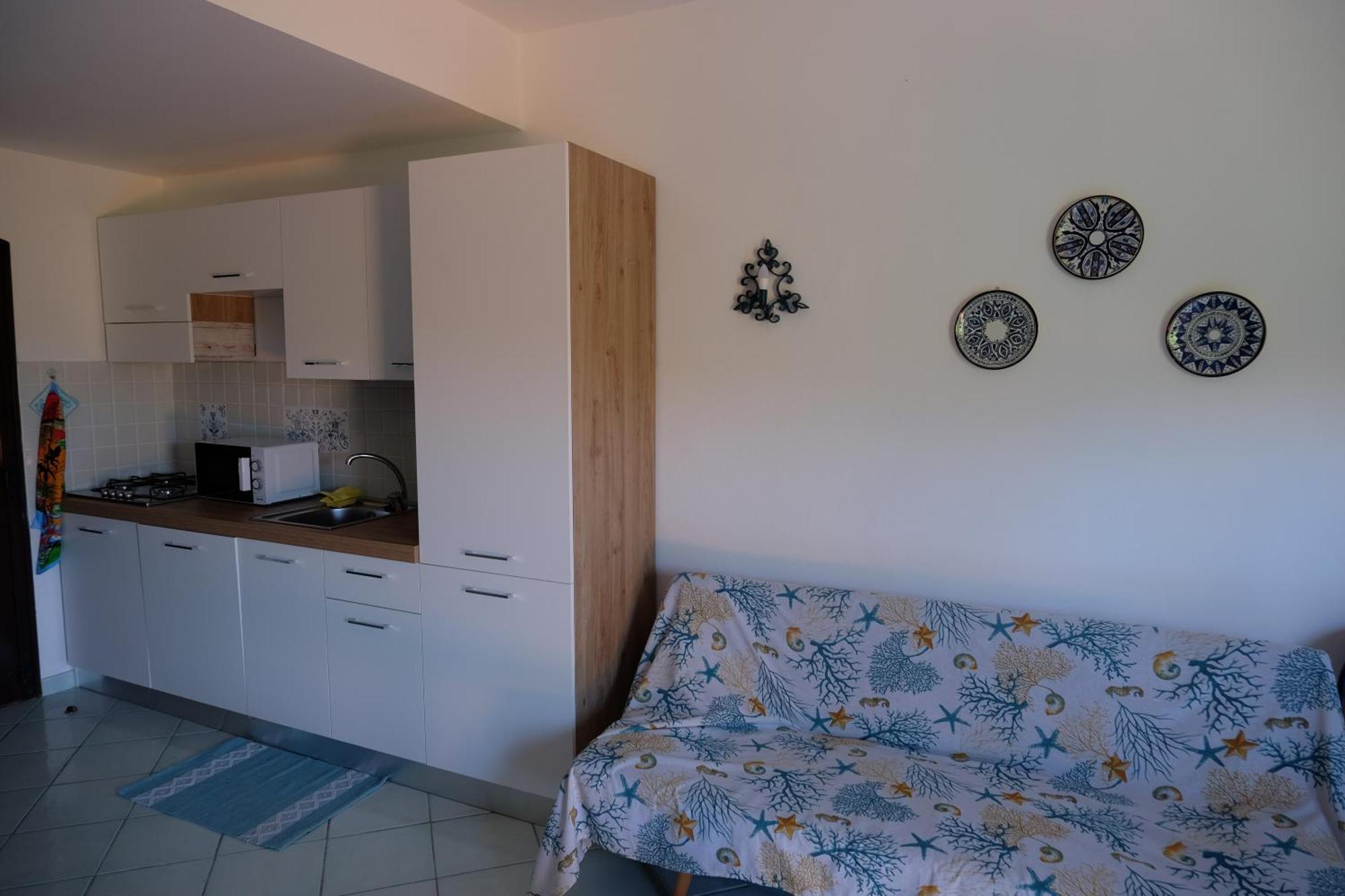 Calarossa Sardinia Apartments Изола-Росса Экстерьер фото